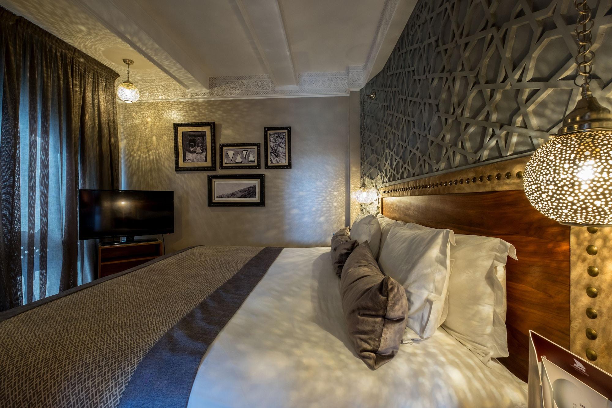هيفيرنادج فندق وسبا مراكش المظهر الخارجي الصورة A bedroom at the hotel