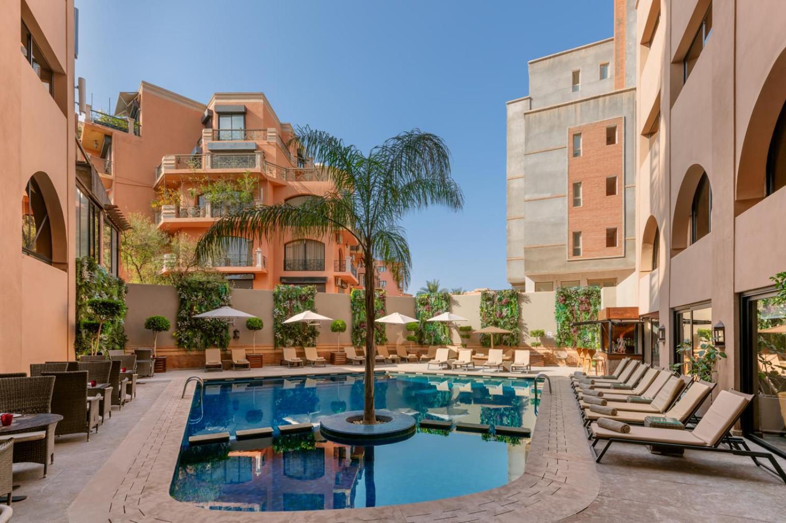 هيفيرنادج فندق وسبا مراكش المظهر الخارجي الصورة The swimming pool at the hotel